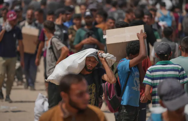 Gaza: Dozens Killed Near Aid Center