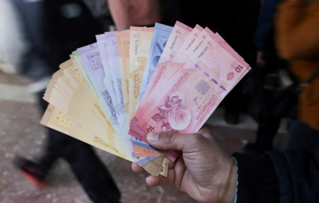 انخفاض قيمة الليرة السورية مقابل الدولار