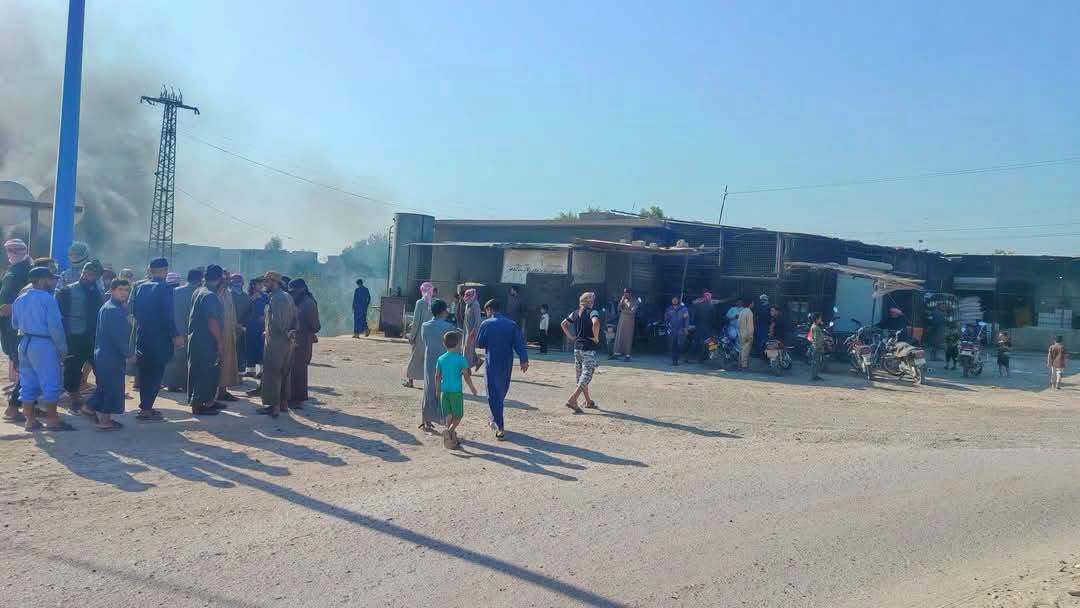 For the second consecutive day, residents of Al-Shuhail block the road to the Al-Omar oil field in protest against rising fuel prices.